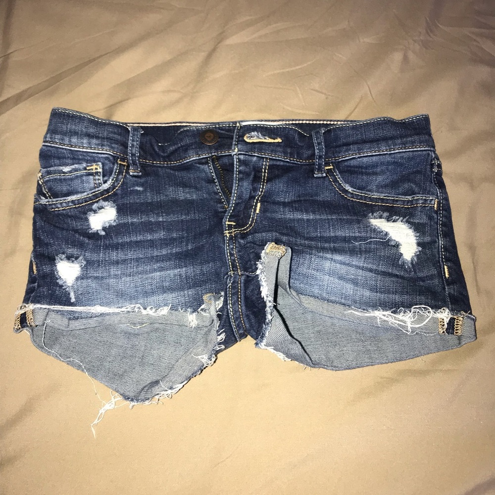 Hollister ripped jean shorts.
